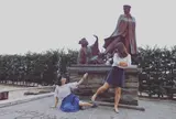 貫一お宮の像（お宮の松停留所)