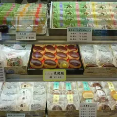 丸万