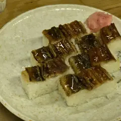 丸萬