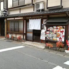 すけ六