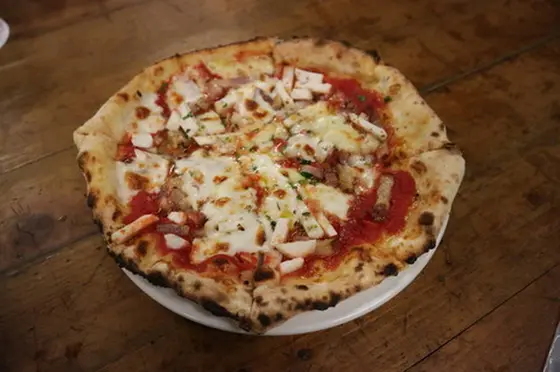 Pizza baked by stone oven