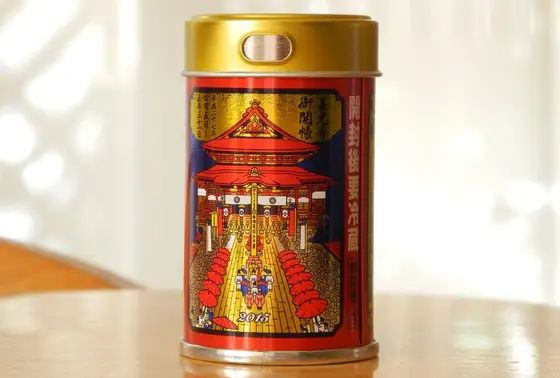 八幡屋礒五郎の御開帳缶