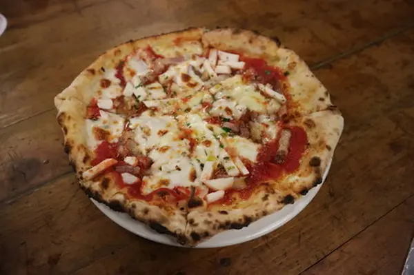 Pizza baked by stone oven