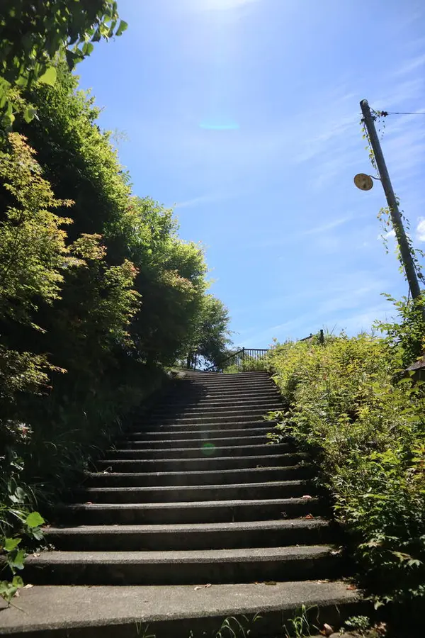 Walking up stone stairs