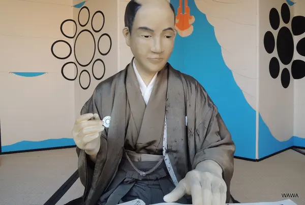 旅役人像