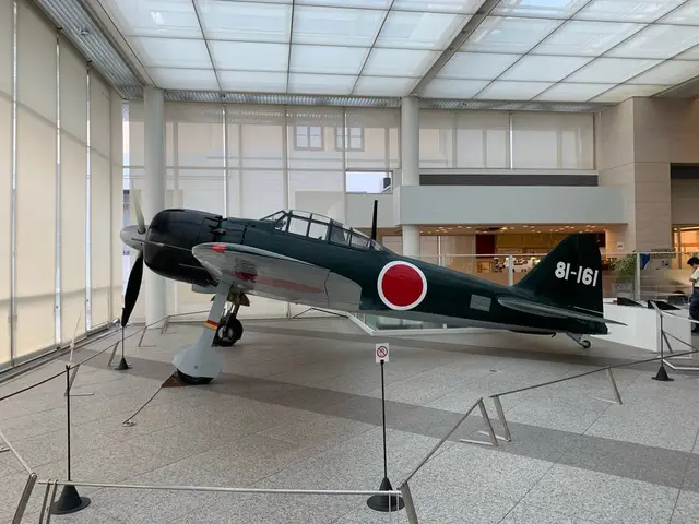 遊就館
