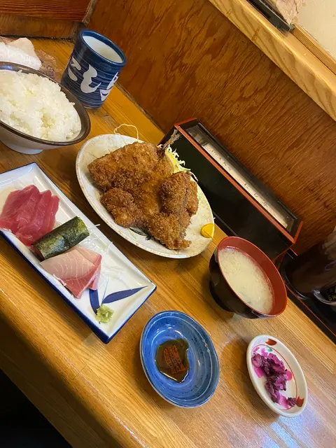 にし与